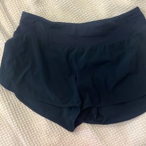 Navy lululemon 4 inch lined shorts